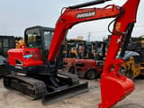2024 Doosan DX60-9C mini excavator, side view