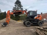 2023 Hitachi Zaxis 155W-7 wheel excavator, side view