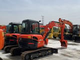 2022 Kubota U55-4 mini excavator, front three-quarter view