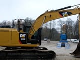 2012 Caterpillar 320EL crawler excavator, side profile view