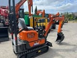 2023 Hitachi ZX10U-6 Mini Excavator from a rear three-quarter view, highlighting the operator's station and controls.
