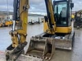2022 Caterpillar 305E2 mini excavator, front three-quarter view