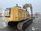 2015 Caterpillar 323E crawler excavator rear three-quarter view