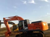 2018 Hitachi Zaxis 210-3 crawler excavator, side view