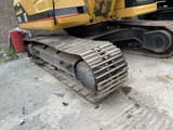 2015 Caterpillar 325B crawler excavator undercarriage view