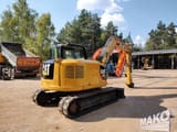 2015 Caterpillar 308E2CR crawler excavator, rear three-quarter view