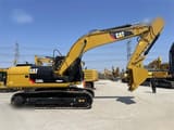 2025 Caterpillar 320D2 paletli ekskavatör, yan profil görünümü
