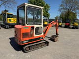 1990 Schaeff HR02 mini excavator, rear three-quarter view