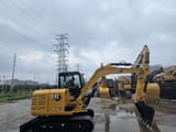 2022 Caterpillar 305.5E2 mini excavator, side profile view