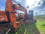 2017 Doosan DX140LCR-5 crawler excavator, front three-quarter view