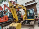 2010 Komatsu PC70 mini excavator, front three-quarter view