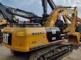 2026 Caterpillar 325D crawler excavator, rear three-quarter view