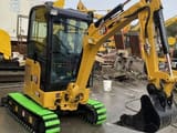 2023 Caterpillar 302 mini excavator, front three-quarter view