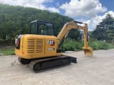 2023 Caterpillar 306E2 crawler excavator, rear three-quarter view