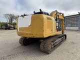 2012 Caterpillar 320E crawler excavator, rear three-quarter view