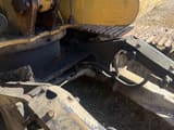1998 Caterpillar 307C crawler excavator undercarriage and cab base detail