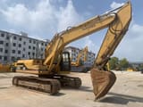 Escavatore cingolato Caterpillar 320BL del 2015, vista laterale