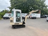 1995 Schaeff HR 12 mini excavator, side view