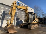 2001 Caterpillar 317B crawler excavator, front three-quarter view