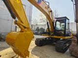 Caterpillar 320D crawler excavator, front three-quarter view