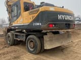 2020 Hyundai R210W-9T wheel excavator, rear three-quarter view