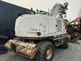 2005 CASE WX165 wheel excavator, rear three-quarter view