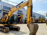 2020 Caterpillar 313D crawler excavator, front three-quarter view