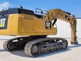 2016 Caterpillar 352F crawler excavator, rear three-quarter view