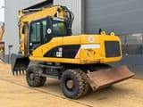 2008 Caterpillar M315D wheel excavator, rear three-quarter view