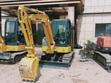 Komatsu PC40MR mini excavator, front three-quarter view