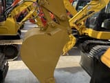 Caterpillar 308E2 mini excavator bucket and boom detail