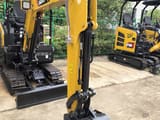 Sany SY16C mini excavator, front view of boom and bucket