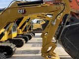 Caterpillar 303.5 mini excavator, side view of boom and arm