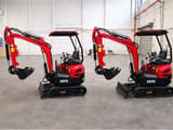 Two Freutek KN15 mini excavators, side view