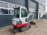 2011 Takeuchi TB219 mini excavator, rear three-quarter view