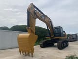 2022 Caterpillar 340D crawler excavator, front three-quarter view