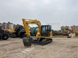 2024 Komatsu PC70-8 mini excavator, front three-quarter view