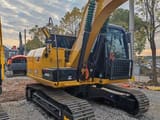 Caterpillar 312D crawler excavator, side view