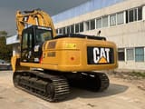 2023 Caterpillar 325D2L crawler excavator, rear three-quarter view