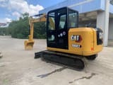 2023 Caterpillar 306E2 crawler excavator, rear three-quarter view