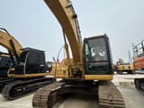 2008 Caterpillar 320D crawler excavator, front-quarter view