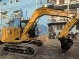 2018 Caterpillar 307E2 mini excavator side view