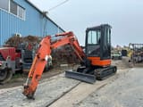 2006 Hitachi ZX27 U-2 mini excavator, front three-quarter view