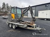 2019 Volvo EC18E crawler excavator on a trailer