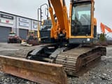 2012 Hyundai R235LCR-9 crawler excavator, front view with blade