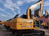 2023 Caterpillar 313D2 GC crawler excavator, rear three-quarter view