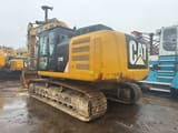 2012 Caterpillar 329E crawler excavator, rear three-quarter view