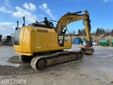 2017 Caterpillar 320FL crawler excavator, rear three-quarter view