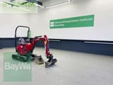 2025 Yanmar VIO12-2A mini excavator, rear three-quarter view
