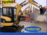 Caterpillar 303CR mini excavator, front three-quarter view
